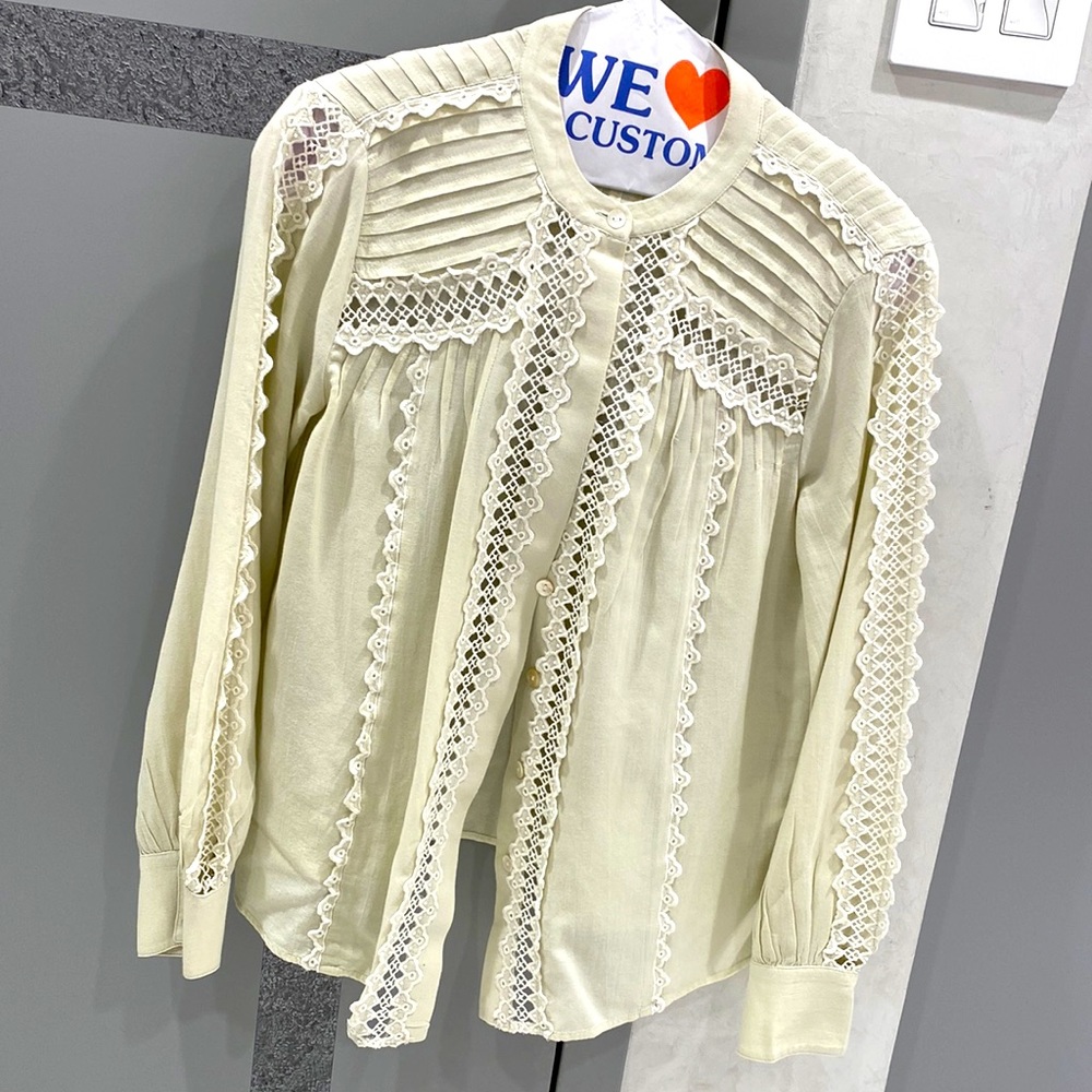 Light green cotton/viscose blouse